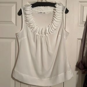 Sleeveless white blouse